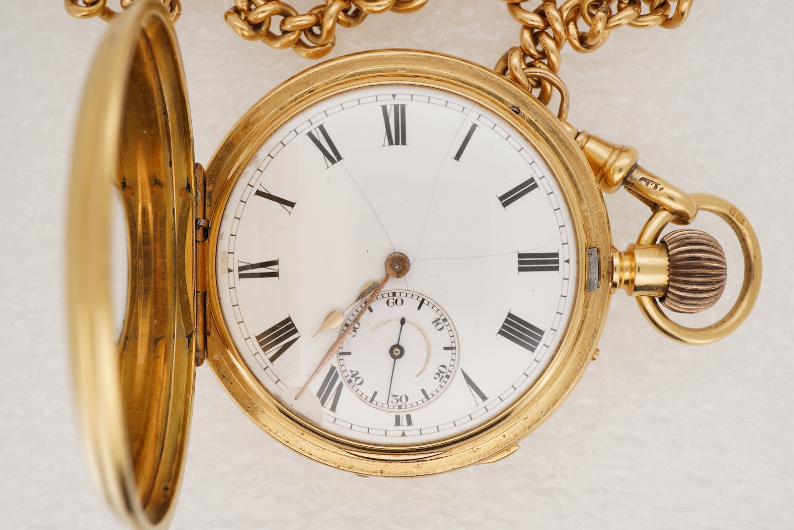 A late Victorian 18ct gold half hunter quarter repeating keyless lever pocket watch, by Alexander Guillaume, Spencer St, Northampton Sq. London, together with a similar 18ct gold curb link albert, hung with a yellow meta